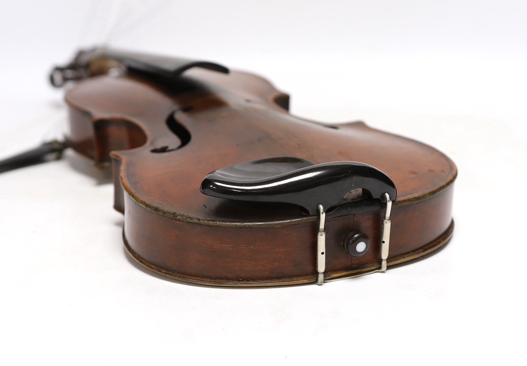 A violin labelled 'Albani Palermo', cased, length of back 35.5cm